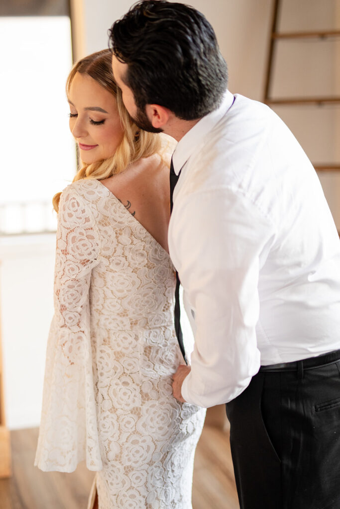 romantic elopement couple getting ready together in an airbnb in sedona