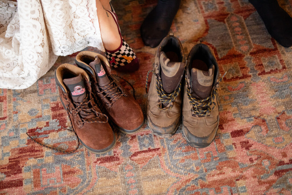 close up elopement photography of hiking boots ready for the couple's adventure elopement in sedona