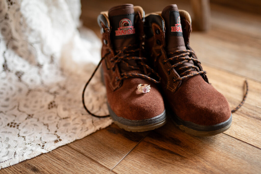 close up elopement photography of hiking boots ready for the couple's adventure elopement in sedona