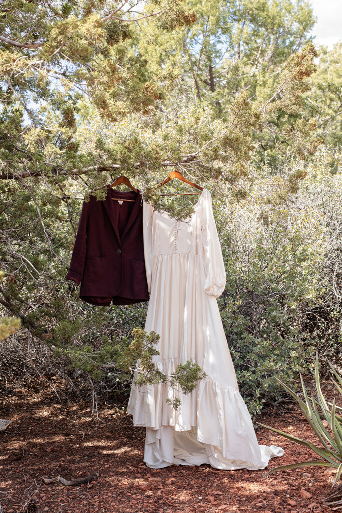 elopement attire hung on a tree 