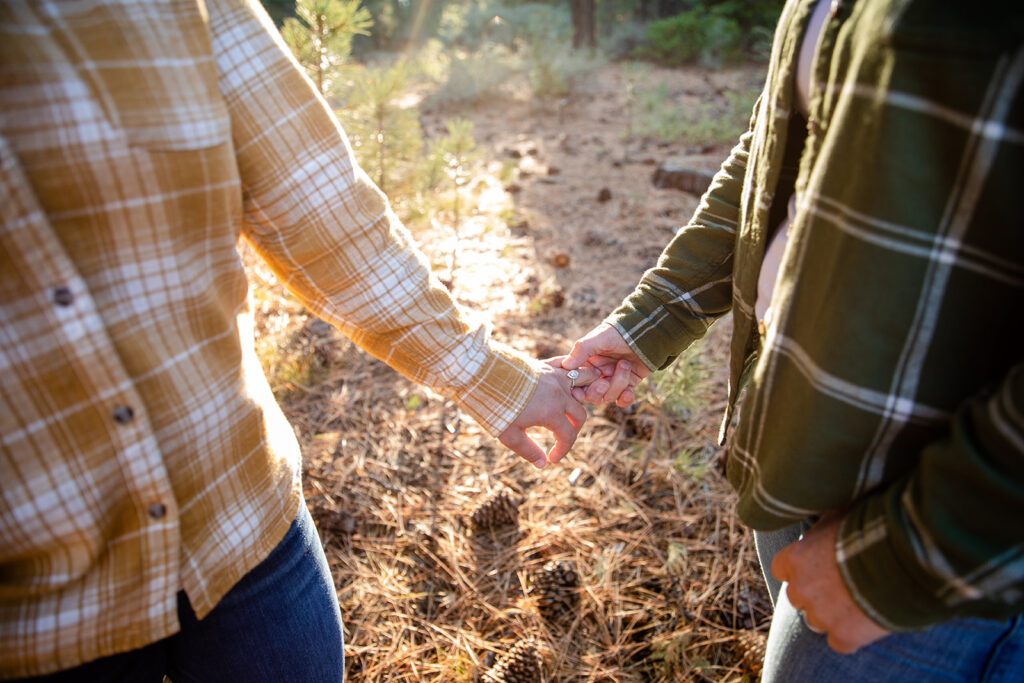 romantic golden hour engagement session in the forest