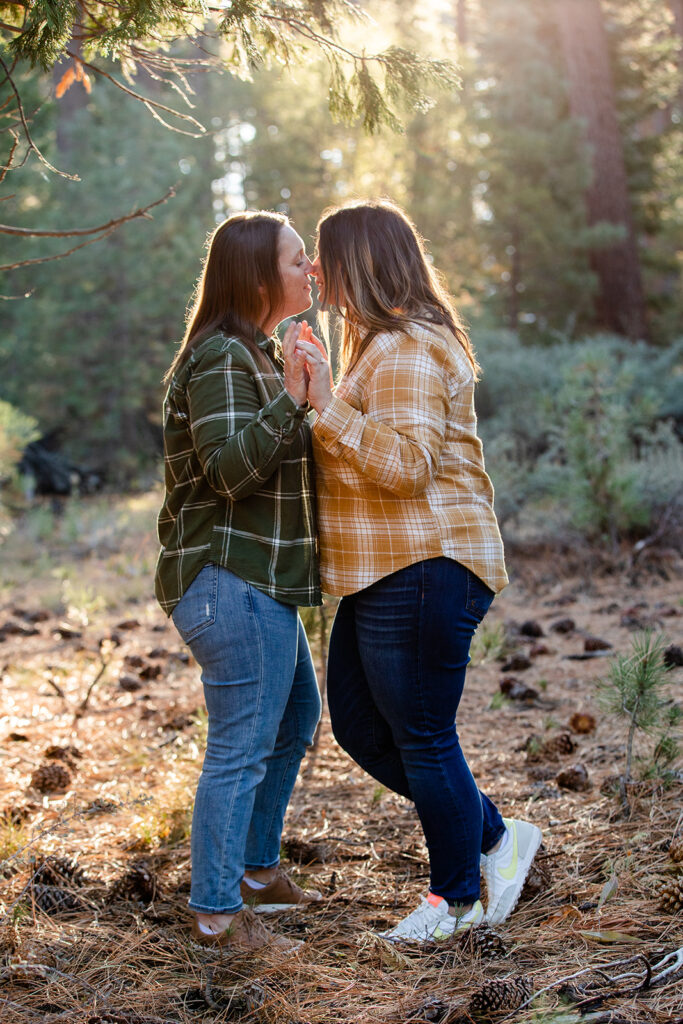 romantic golden hour engagement session in the forest