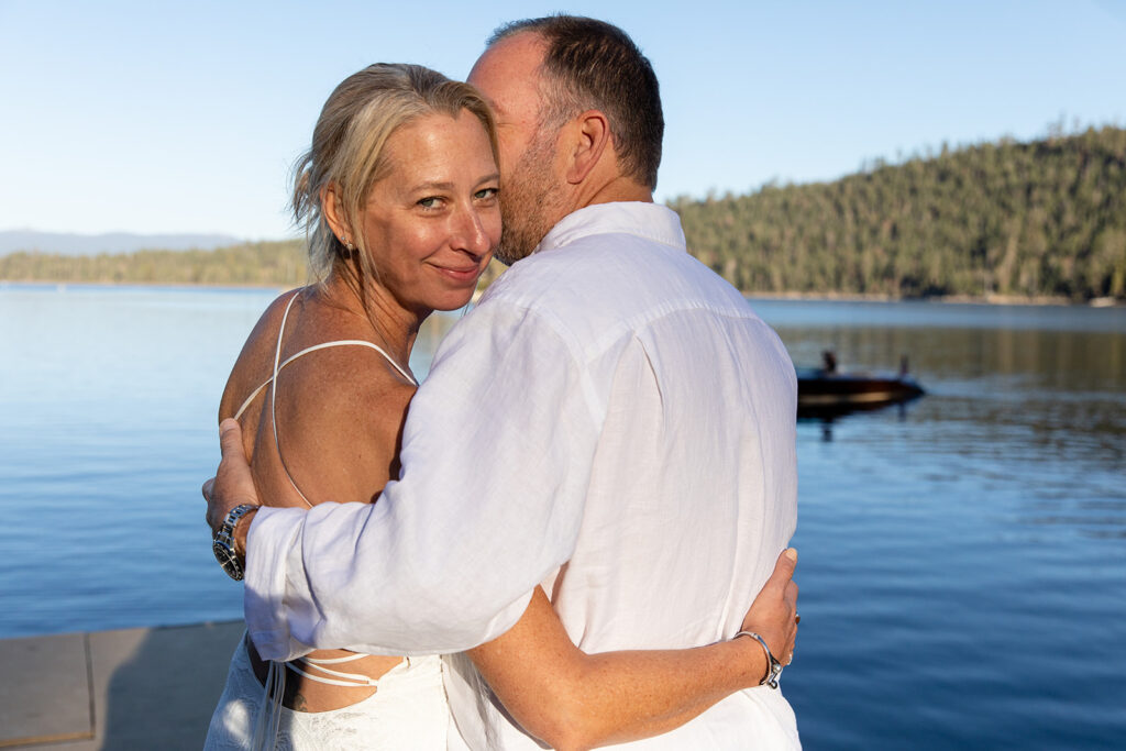 an elopement couple lovingly gazing upon each other at the shores on lake tahoe