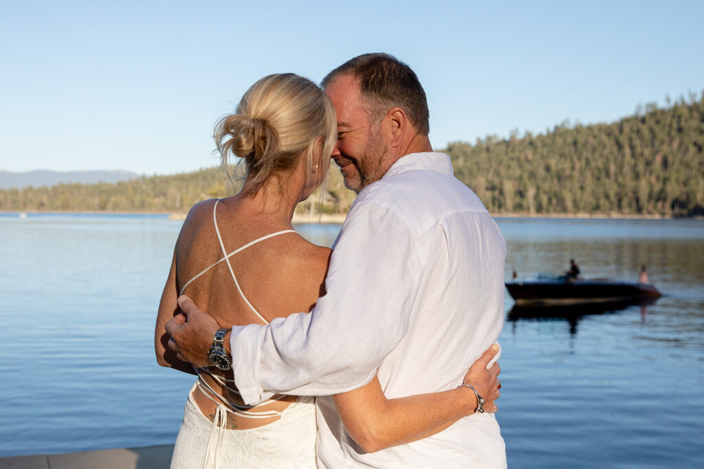 an elopement couple lovingly gazing upon each other at the shores on lake tahoe