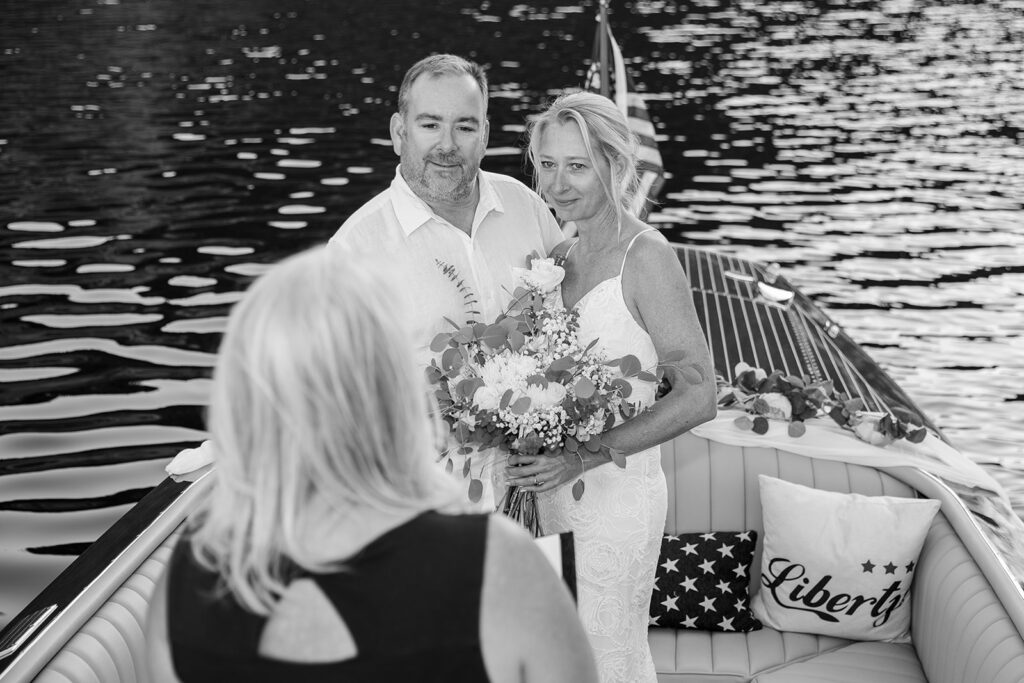 an intimate elopement ceremony on a boat in Lake Tahoe