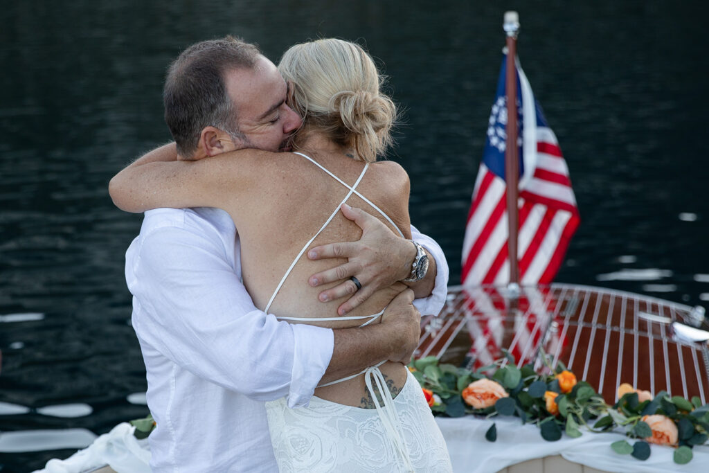 an intimate elopement ceremony on a boat in Lake Tahoe