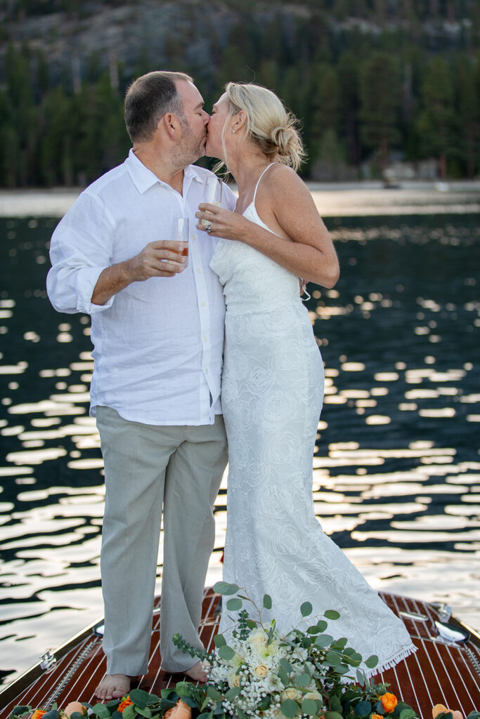 romantic bride and groom portraits on a classic boat in Lake Tahoe