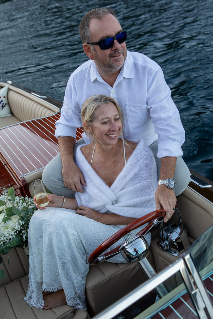 romantic bride and groom portraits on a classic boat in Lake Tahoe