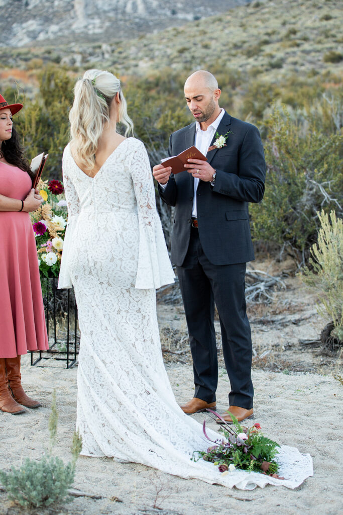 bride and groom exchanging vows during their boho elopement in California