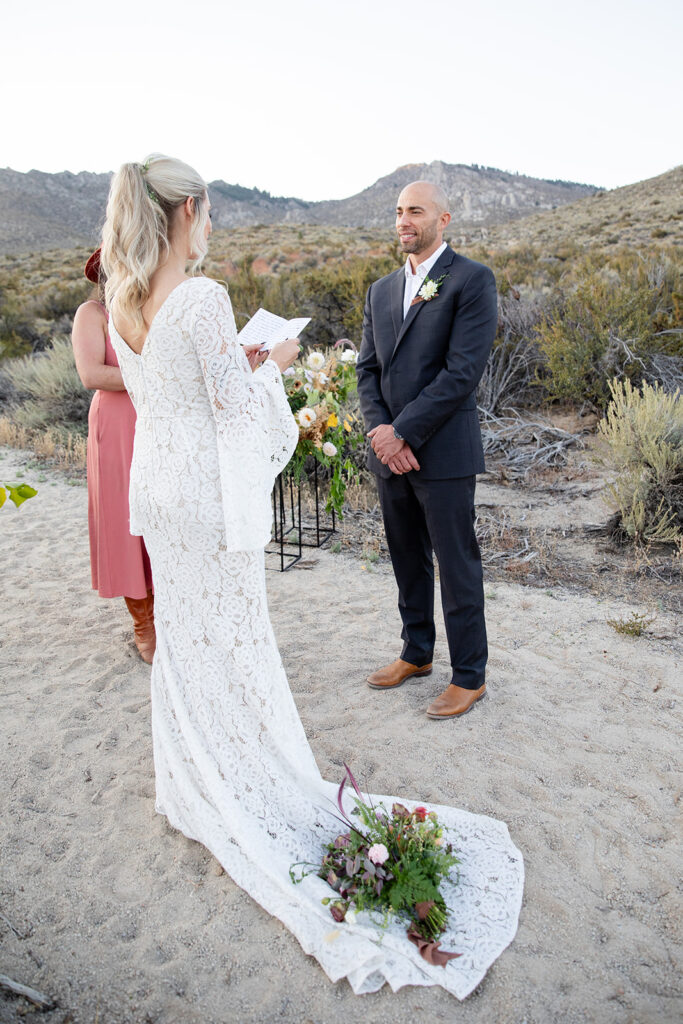 bride and groom exchanging vows during their boho elopement in California