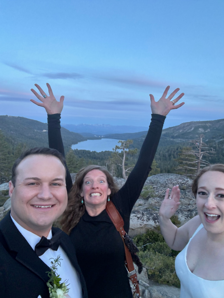 lake tahoe elopement planner and photographer posing with the couple during the elopement day