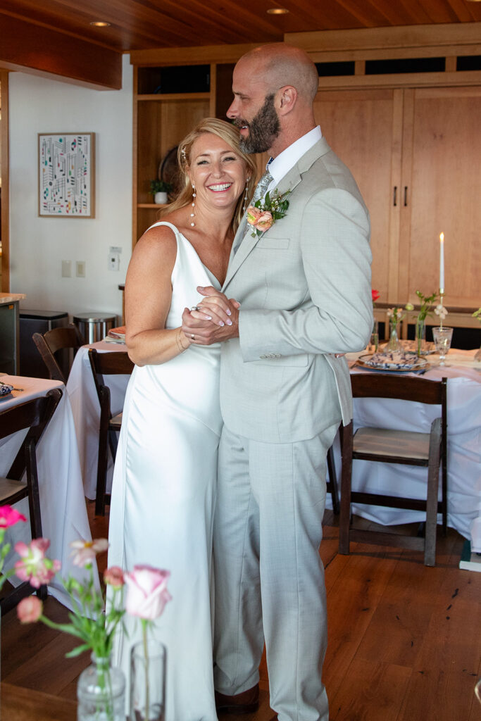 bride and groom first dance in an airbnb during their micro wedding in Lake Tahoe