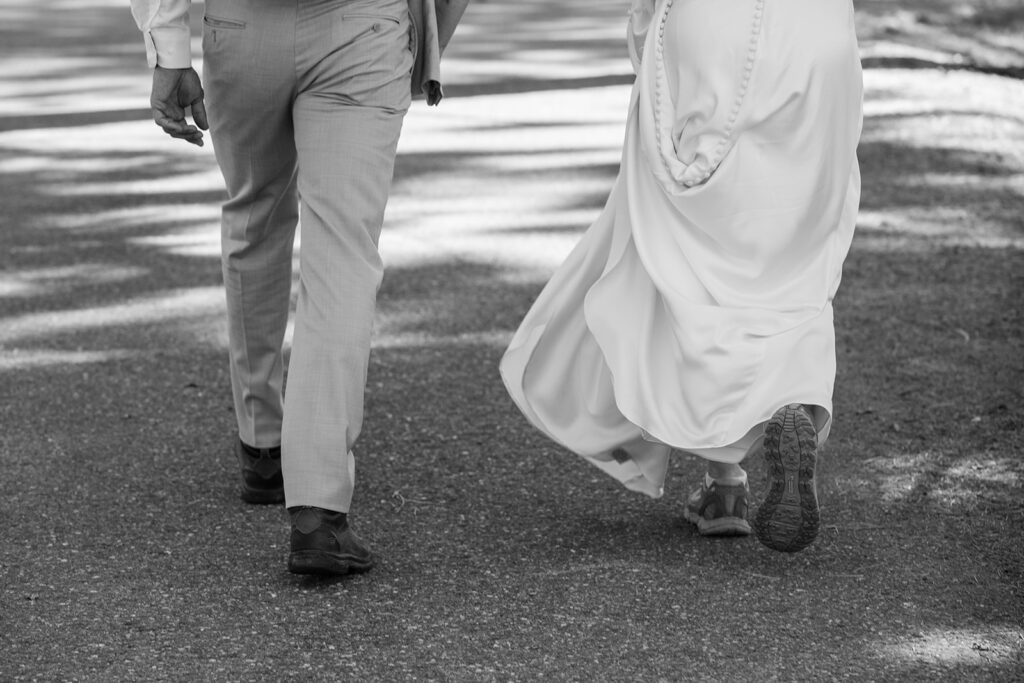 bride and groom going on a hike during their micro wedding in Lake Tahoe