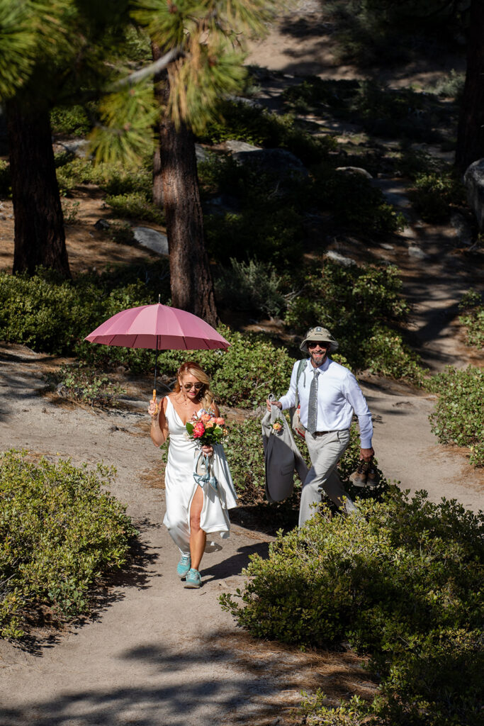 bride and groom going on a hike during their micro wedding in Lake Tahoe