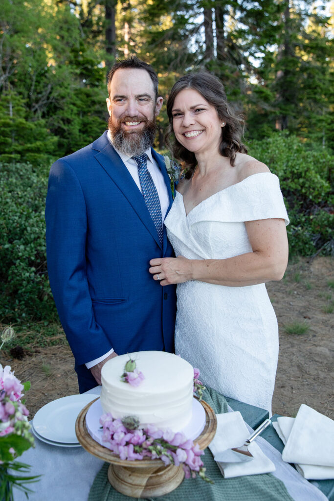 bride and groom cutting cake