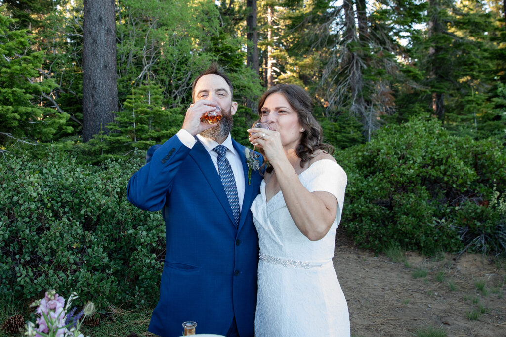 bride and groom enjoying a drink together