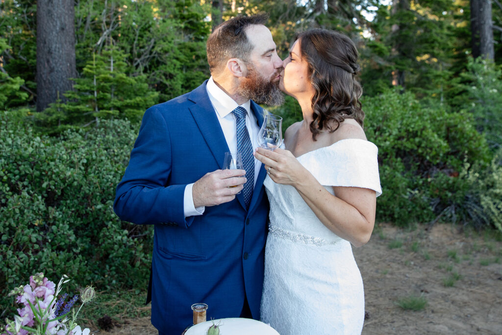 bride and groom enjoying a drink together