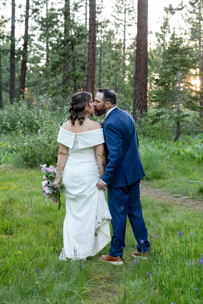 bride and groom in a lush green forest in Lake Tahoe