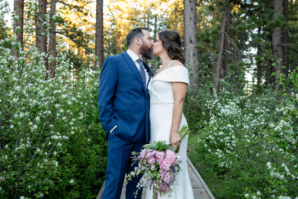 bride and groom in a lush forest at skylandia park, tahoe