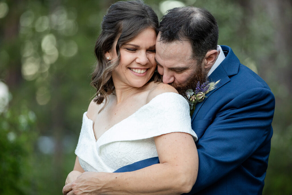 bride and groom in a lush forest at skylandia park, tahoe