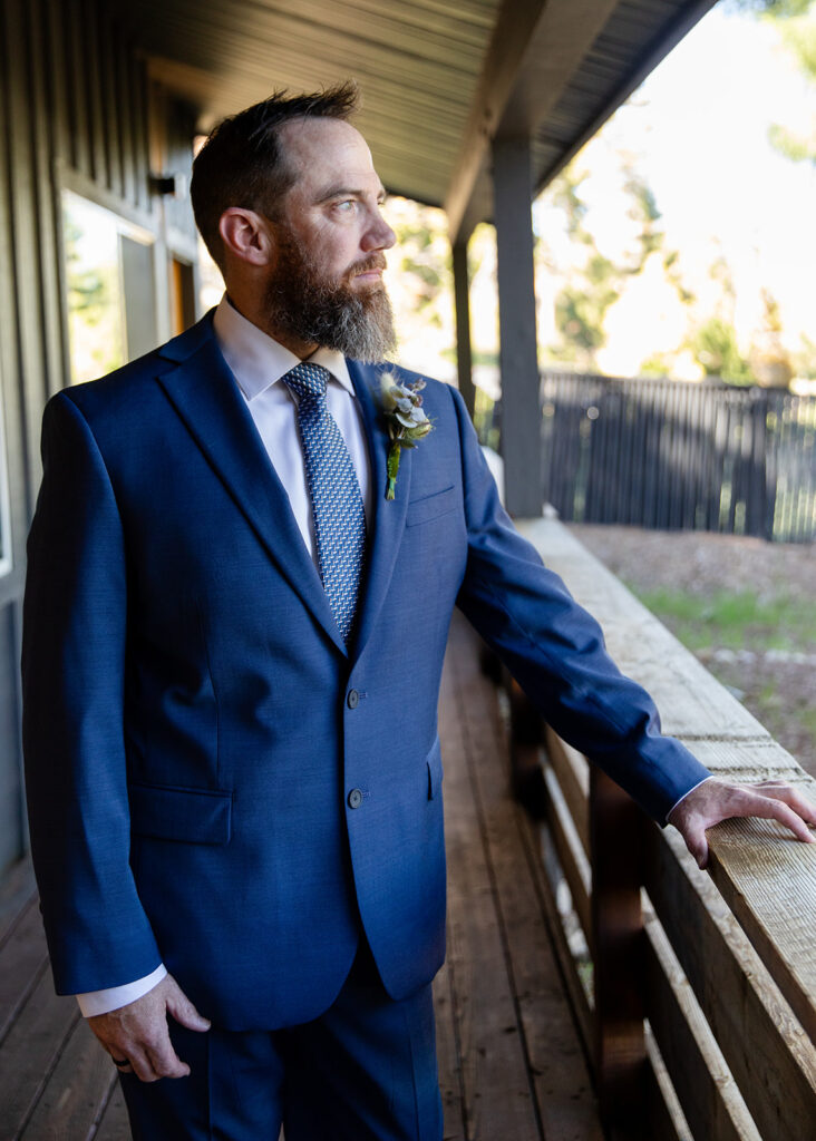 groom portrait at basecamp hotel