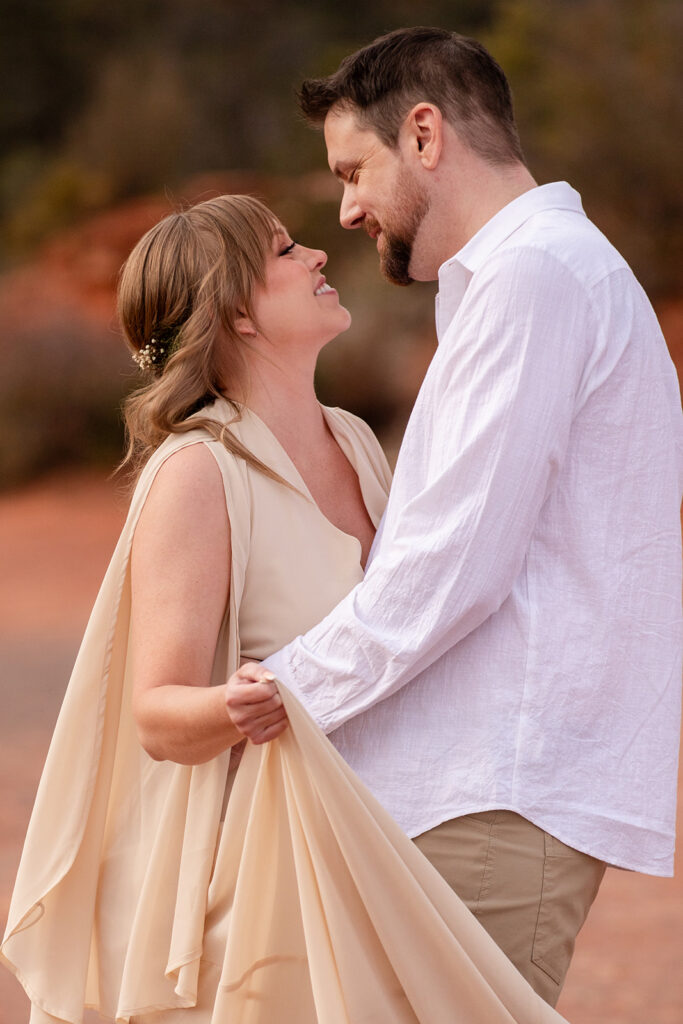 romantic Sedona elopement couple surrounded by red rock landscapes