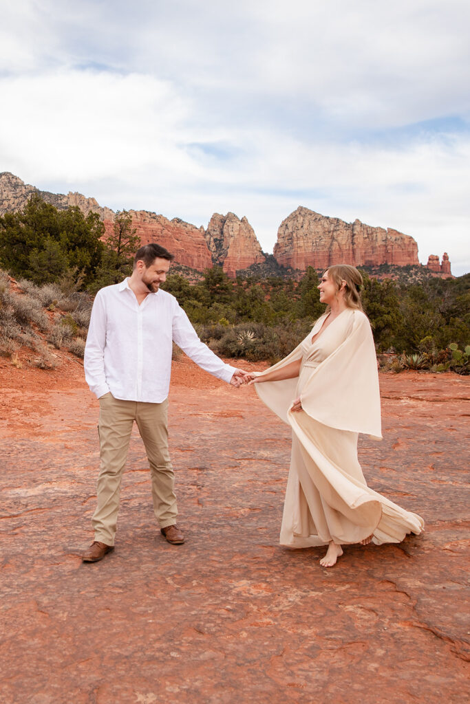 romantic Sedona elopement couple surrounded by red rock landscapes