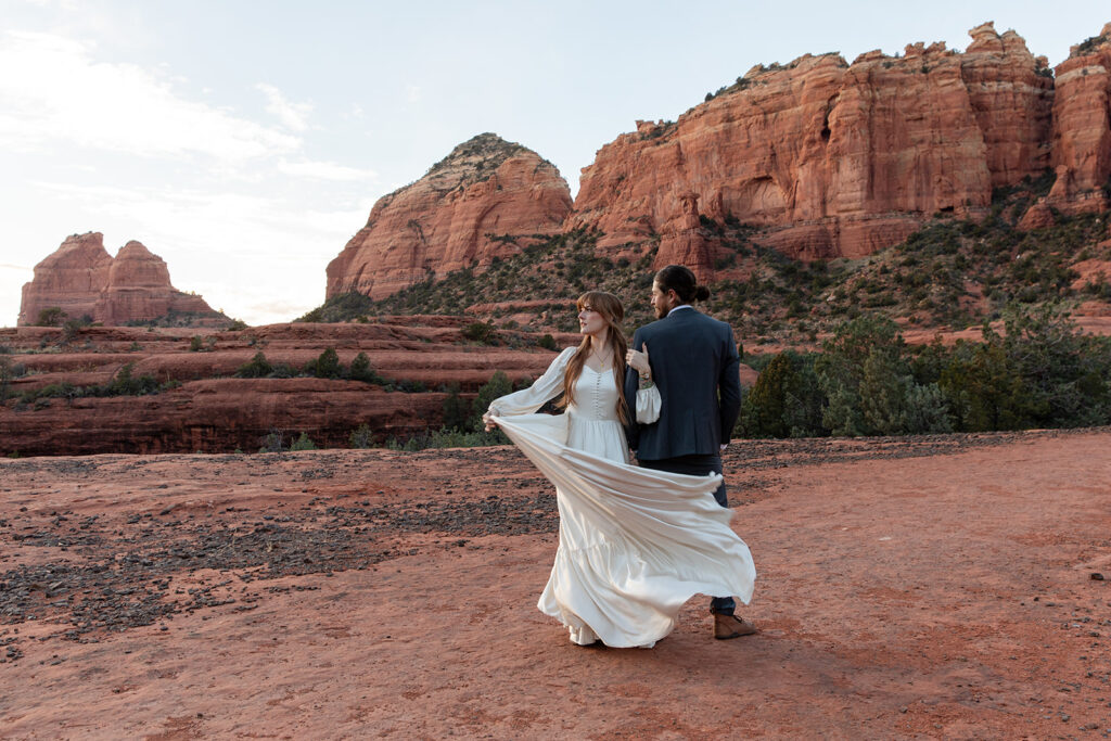 sweet elopement couple hugging and sharing an intimate moment together in Sedona