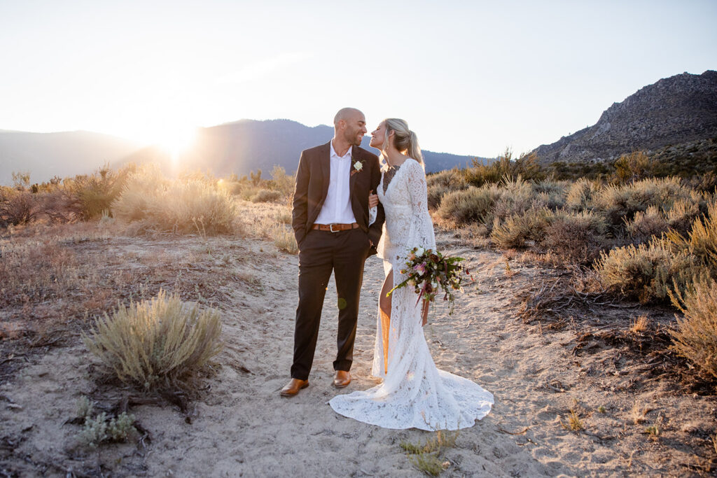 boho elopement couple surrounded by desert landscapes