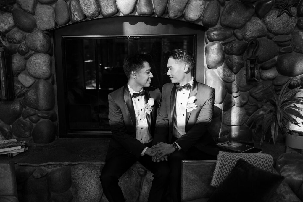 candid photo of two grooms