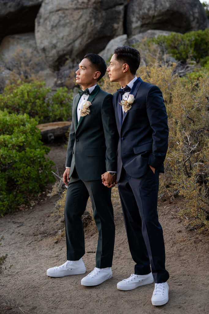 sweet lgbtq couple during their hiking elopement in logan shoals, lake tahoe