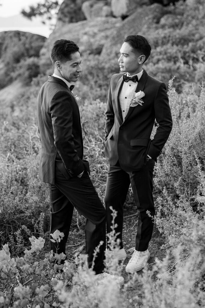 sweet lgbtq couple during their hiking elopement in logan shoals, lake tahoe