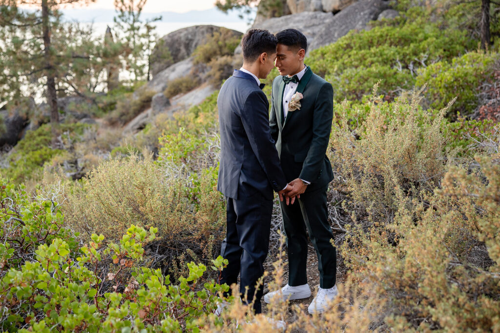 sweet lgbtq couple during their hiking elopement in logan shoals, lake tahoe