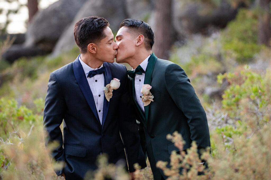 sweet lgbtq couple during their hiking elopement in logan shoals, lake tahoe