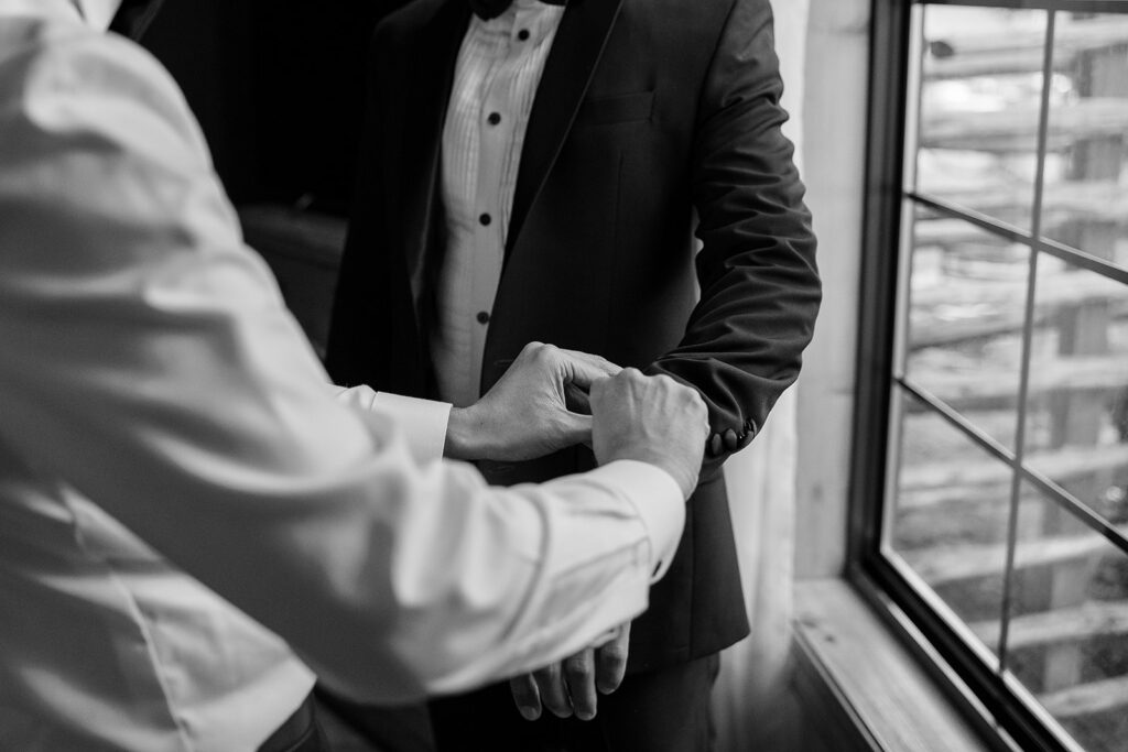 both grooms getting ready at black bear lodge, lake tahoe