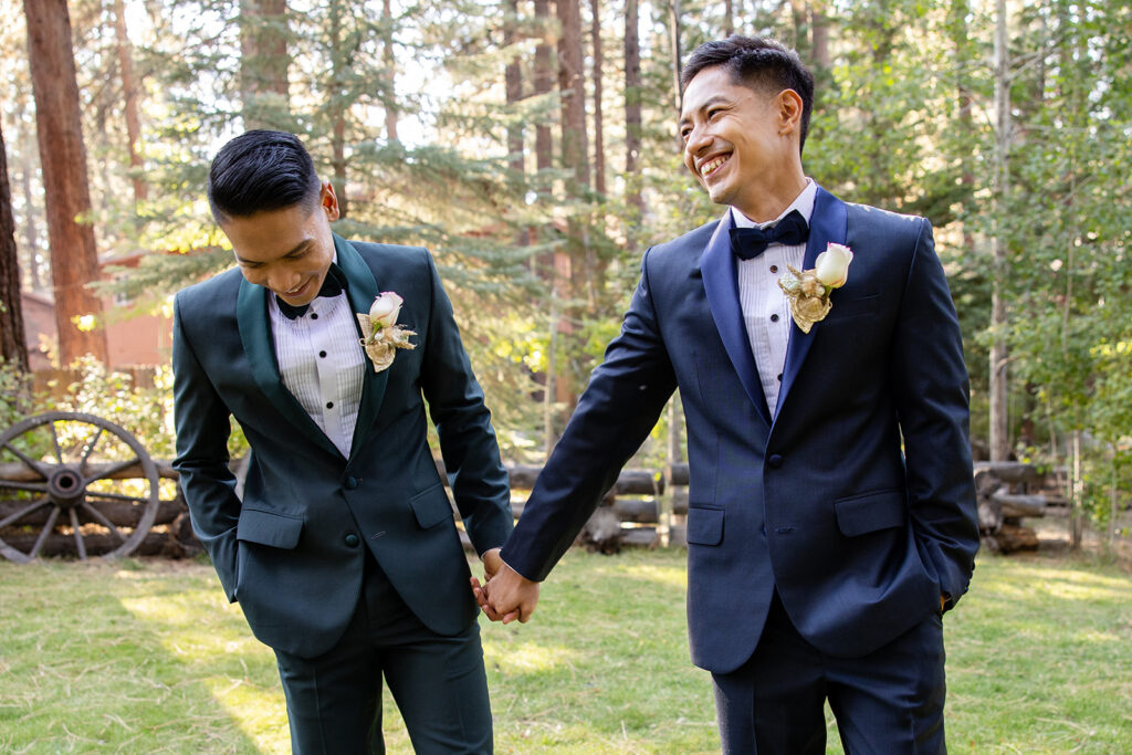 two grooms enjoying their hiking elopement day