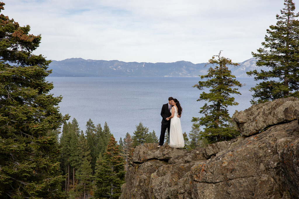 elopement couple hugging at Monkey Rock, Lake Tahoe