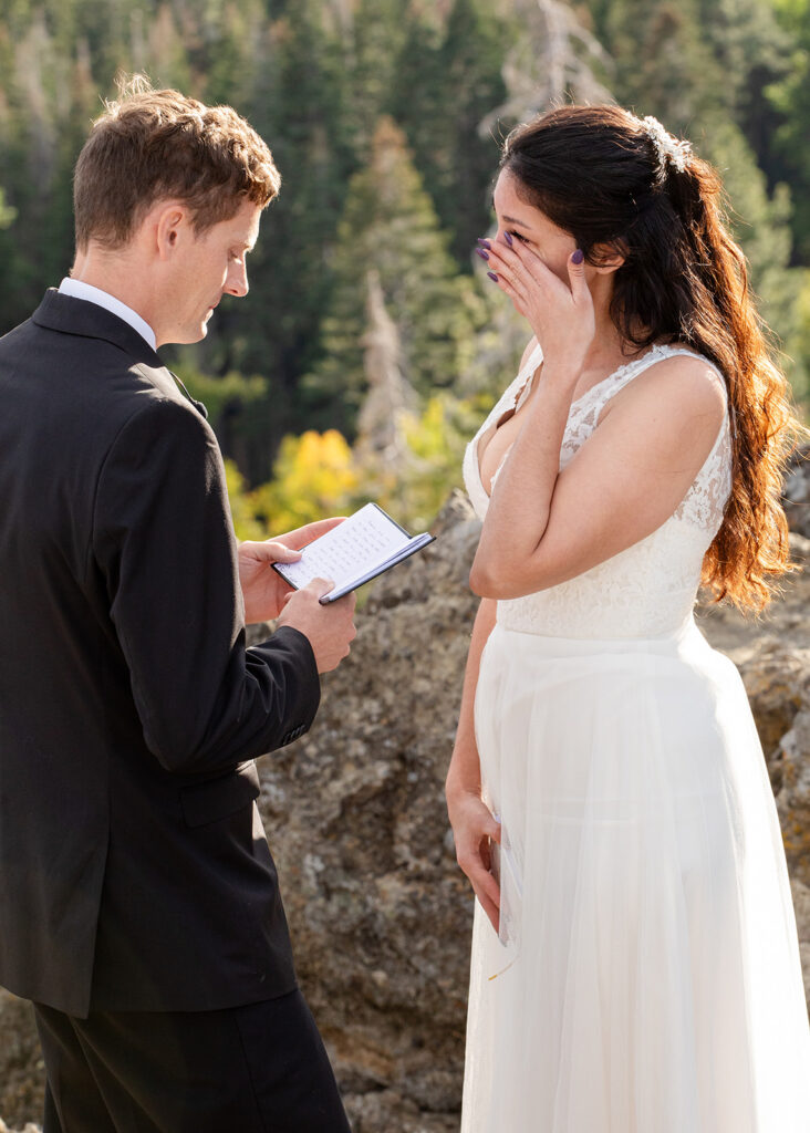 emotional and candid monkey rock elopement ceremony with beautiful views