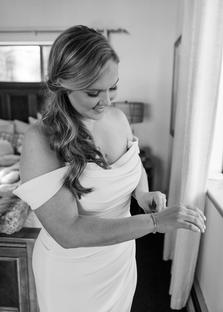 bride getting ready in a cozy airbnb