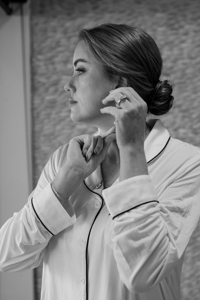 bride getting ready in a cozy airbnb