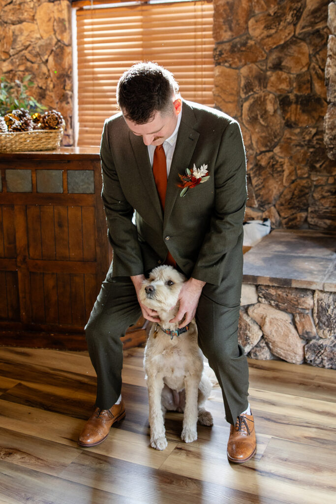 groom getting ready photos with their dog