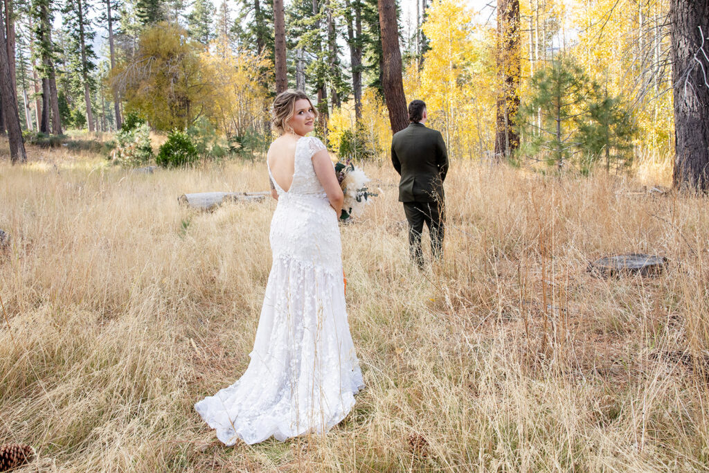 bride and groom first look at taylor creek for their south lake tahoe elopement