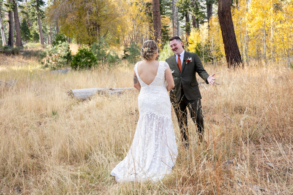 bride and groom first look at taylor creek for their south lake tahoe elopement