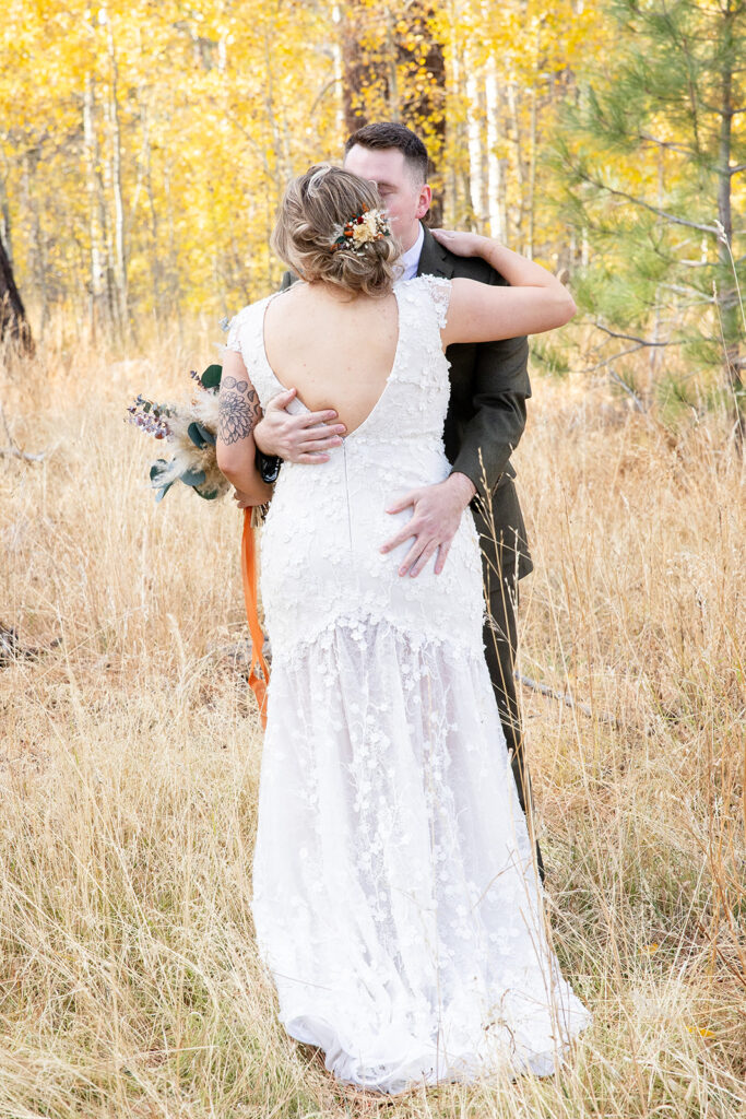 bride and groom first look at taylor creek for their south lake tahoe elopement