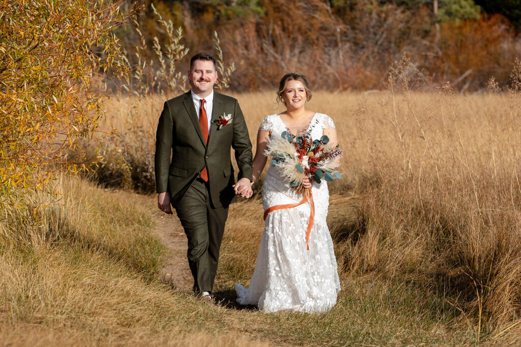 bride and groom walking towards their ceremony location in south lake tahoe