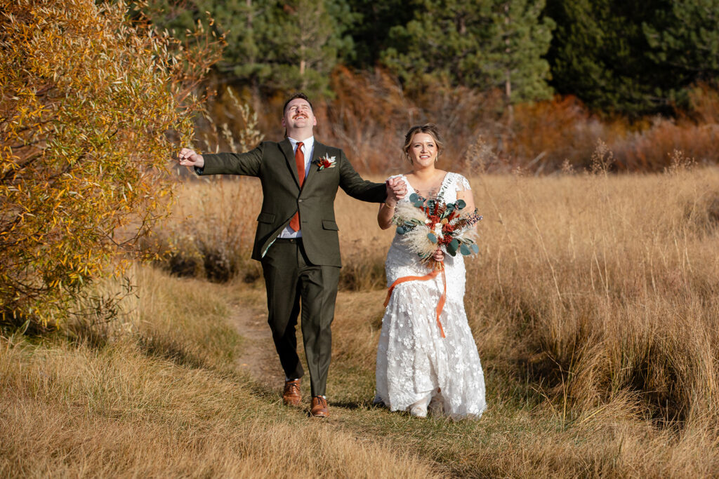 bride and groom walking towards their ceremony location in south lake tahoe