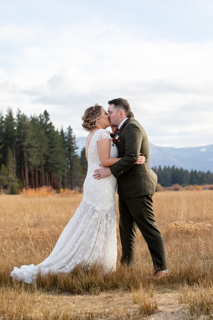 bride and groom first kiss